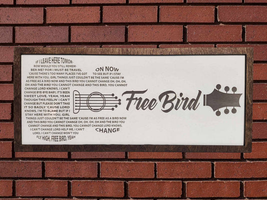 Lynyrd Skynyrd, classic rock, music, unique, Song lyrics: Free bird with bird on the sign